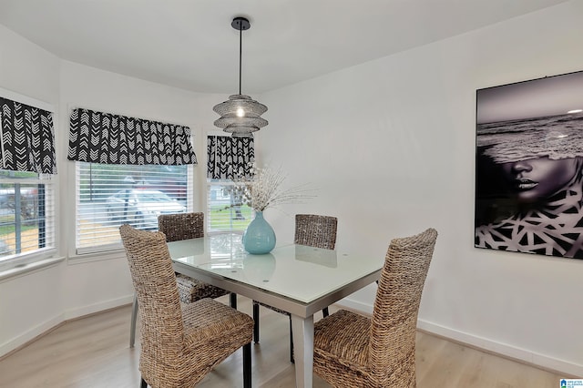 dining room with light wood-type flooring