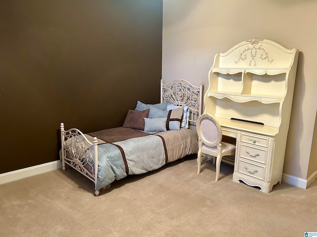 bedroom featuring light colored carpet