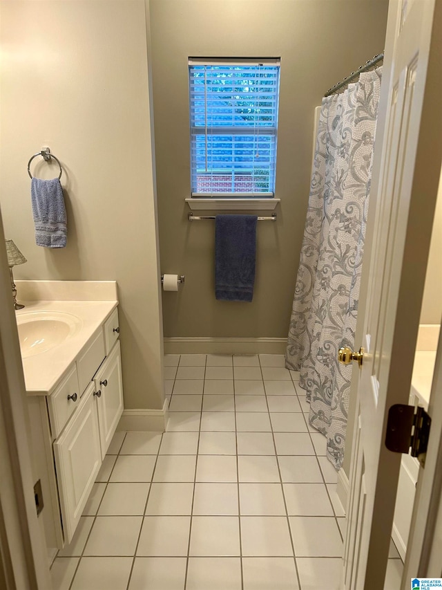 bathroom with vanity and tile patterned floors