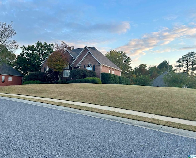 exterior space featuring a lawn