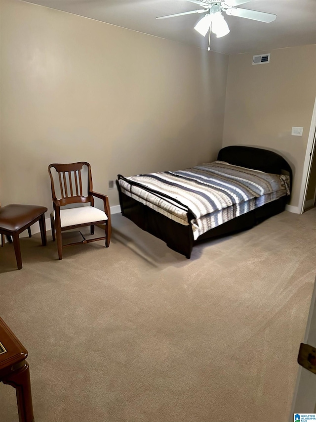 bedroom with ceiling fan and carpet floors