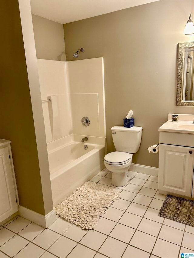 full bathroom with toilet, vanity, tile patterned floors, and tub / shower combination