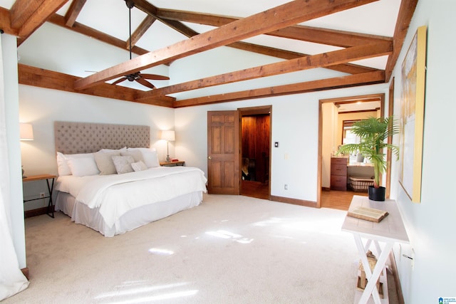 carpeted bedroom with vaulted ceiling with beams and ceiling fan