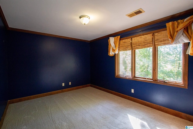 unfurnished room with carpet flooring and ornamental molding