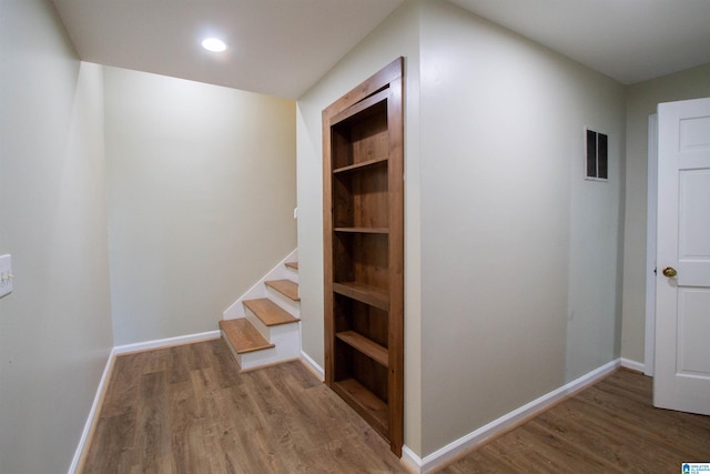 corridor featuring hardwood / wood-style flooring