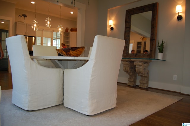 dining room with wood-type flooring