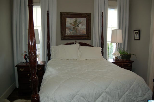 bedroom featuring multiple windows