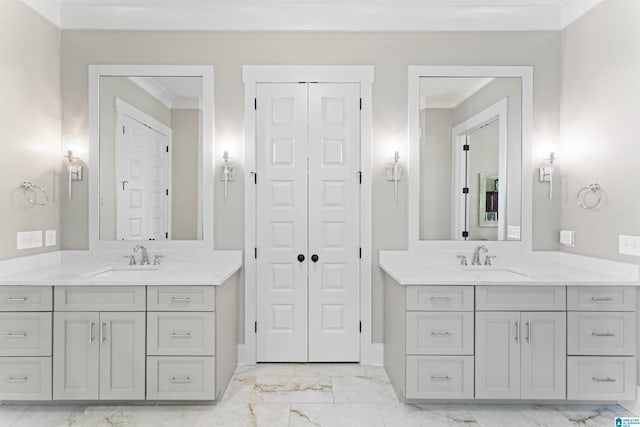 bathroom with vanity and crown molding