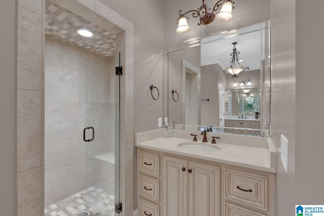 bathroom with vanity and an enclosed shower