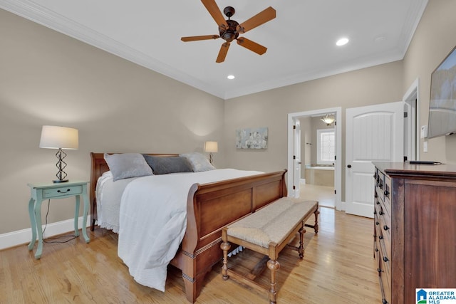 bedroom featuring connected bathroom, light wood-type flooring, ornamental molding, and ceiling fan