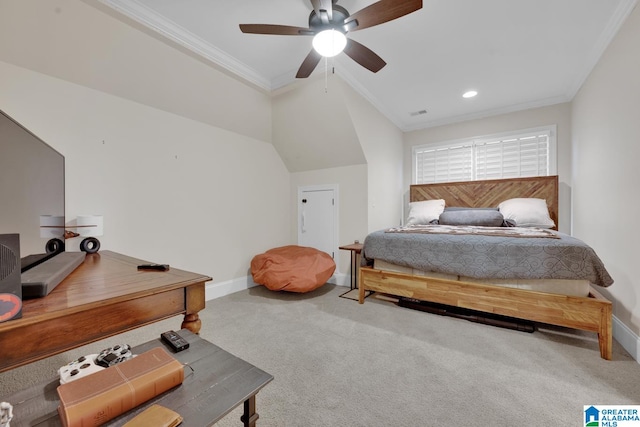 carpeted bedroom featuring ceiling fan, crown molding, and vaulted ceiling