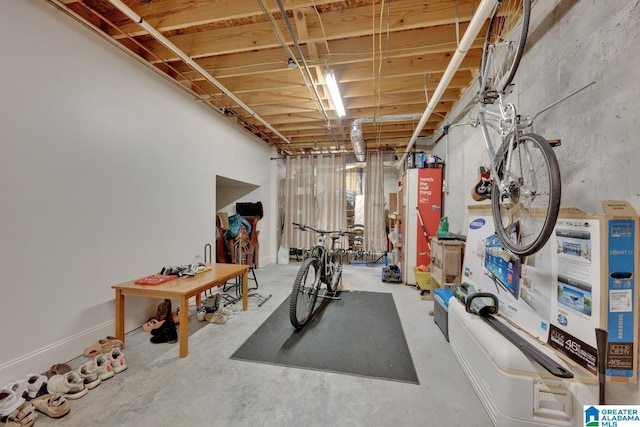 exercise room featuring concrete floors