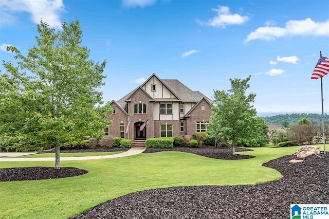 110 Sterling Lakes Dr, Helena, AL 35080 - english style home with brick siding and a front lawn