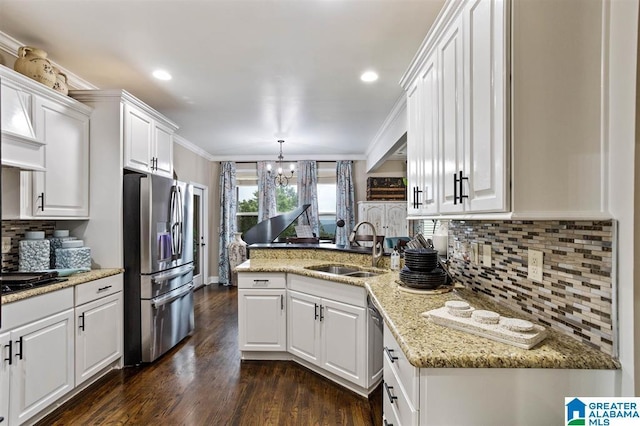 110 Sterling Lakes Dr, Helena, AL 35080 - kitchen featuring appliances with stainless steel finishes, a sink, a chandelier, white cabinetry, and recessed lighting
