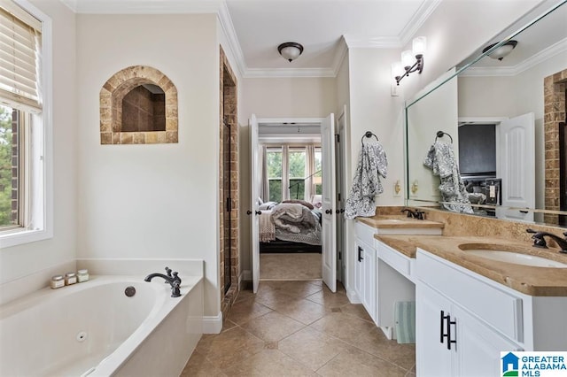 bathroom featuring a wealth of natural light, vanity, a tub to relax in, and crown molding