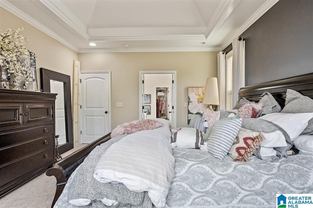110 Sterling Lakes Dr, Helena, AL 35080 - bedroom with ornamental molding, carpet, a tray ceiling, and a walk in closet