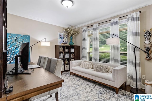 office featuring light hardwood / wood-style floors and crown molding