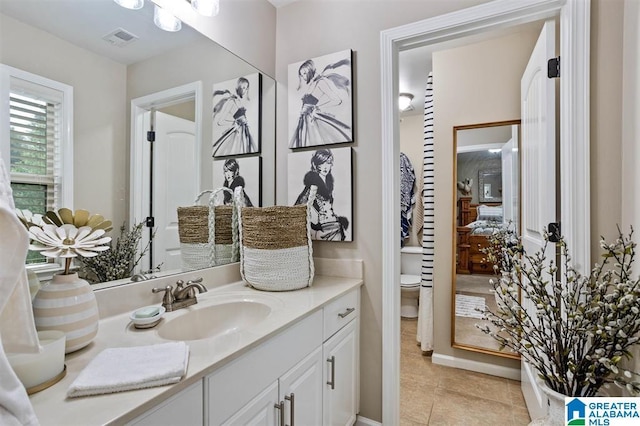110 Sterling Lakes Dr, Helena, AL 35080 - bathroom with vanity, tile patterned floors, and toilet