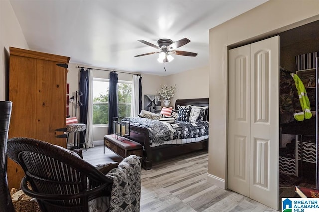 bedroom featuring a closet, ceiling fan, and light hardwood / wood-style floors