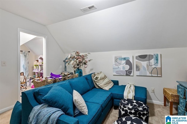 living room featuring light colored carpet and vaulted ceiling