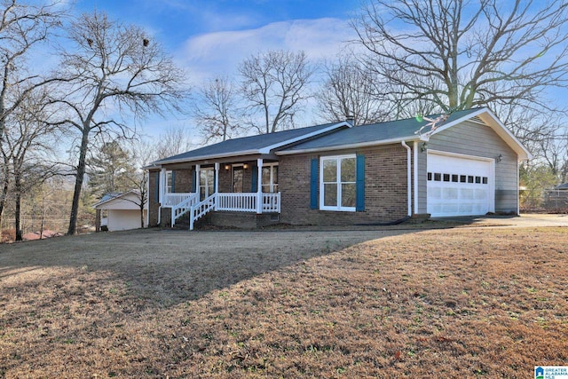 ranch-style home with a front lawn, a porch, and a garage