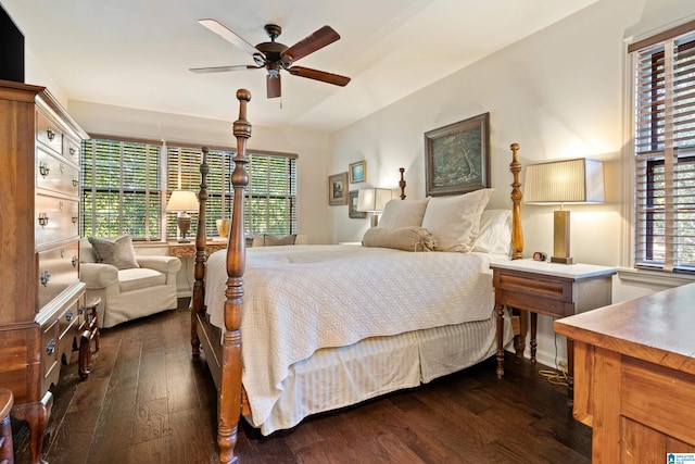 bedroom featuring dark wood-type flooring and ceiling fan