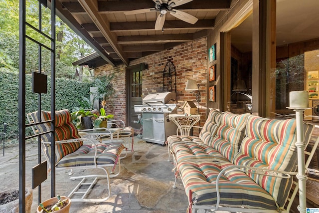 view of patio with grilling area and ceiling fan