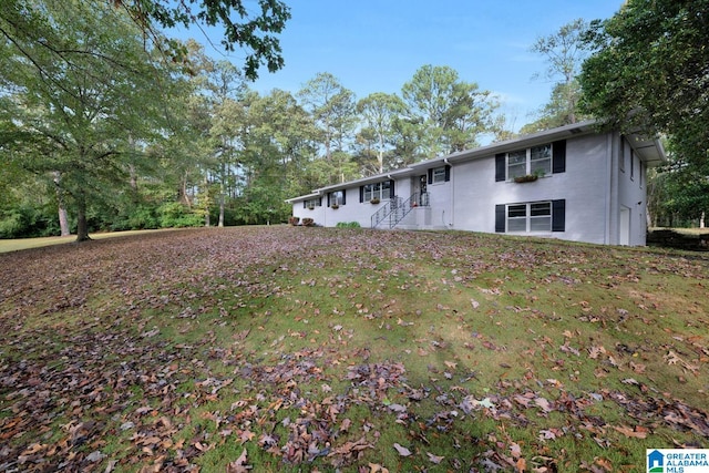 view of front of house with a front lawn