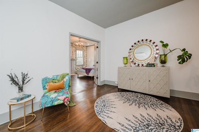 1031 S 26th St, Birmingham, AL 35205 - sitting room featuring a chandelier, wood finished floors, and baseboards