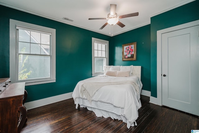 1031 S 26th St, Birmingham, AL 35205 - bedroom with dark wood-type flooring, baseboards, ornamental molding, and ceiling fan