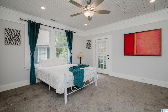 bedroom with multiple windows, wooden ceiling, ceiling fan, and access to exterior