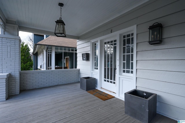 1031 S 26th St, Birmingham, AL 35205 - wooden deck featuring a porch