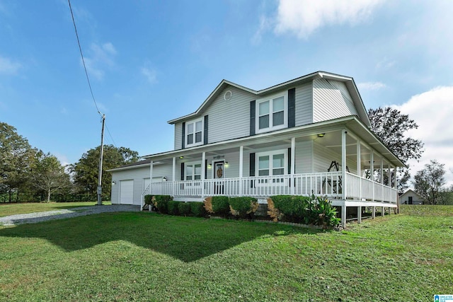 farmhouse featuring a porch, a front lawn, and a garage