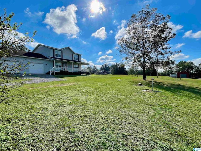 view of yard featuring a garage