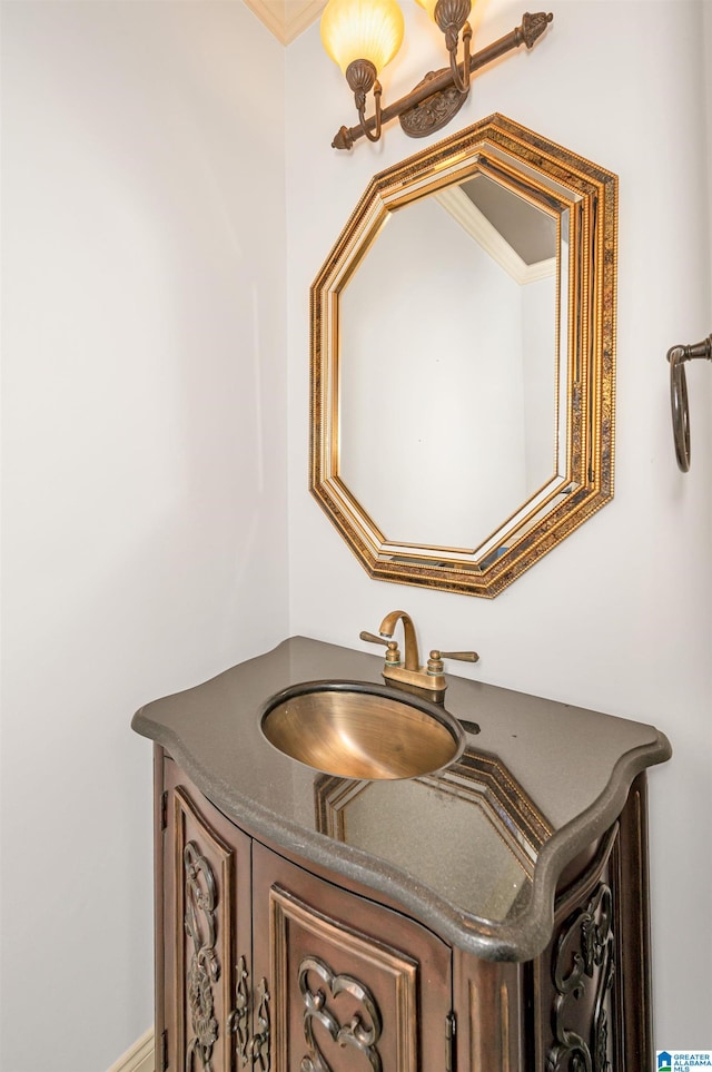 bathroom featuring vanity and crown molding