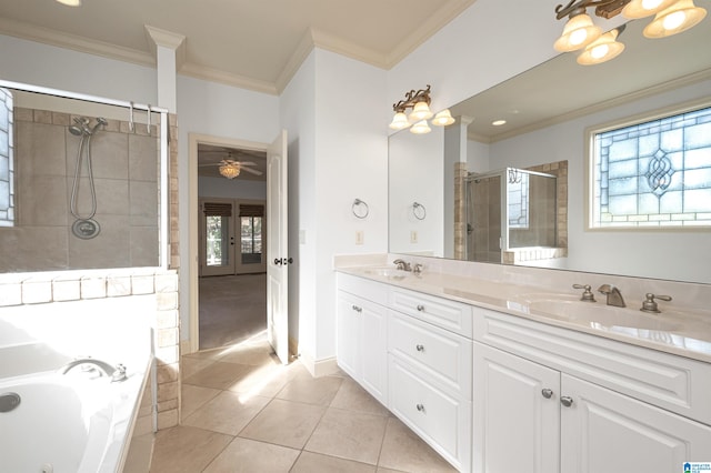 bathroom with crown molding, a wealth of natural light, tile patterned flooring, and independent shower and bath