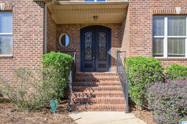 entrance to property featuring french doors