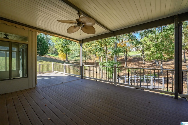 wooden terrace featuring ceiling fan