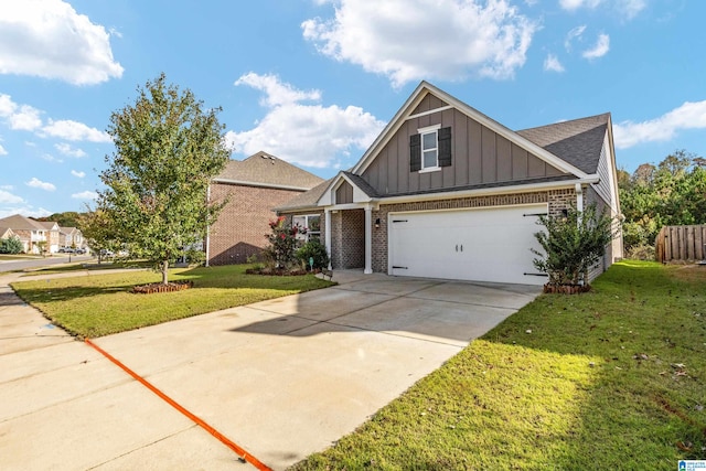 view of front of property with a garage and a front yard