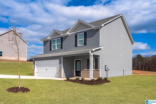 craftsman-style home with a garage and a front lawn