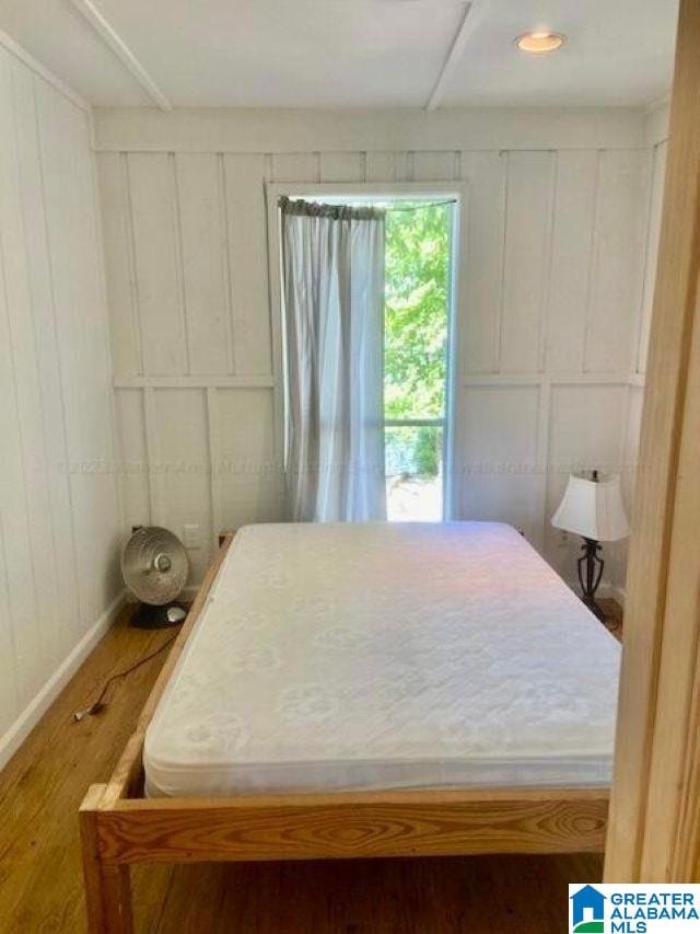 bedroom featuring wood-type flooring