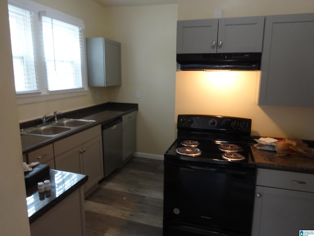 1317 SW 16th St SW, Birmingham, AL 35211 - kitchen featuring extractor fan, black range with electric cooktop, dishwasher, a sink, and wood finished floors