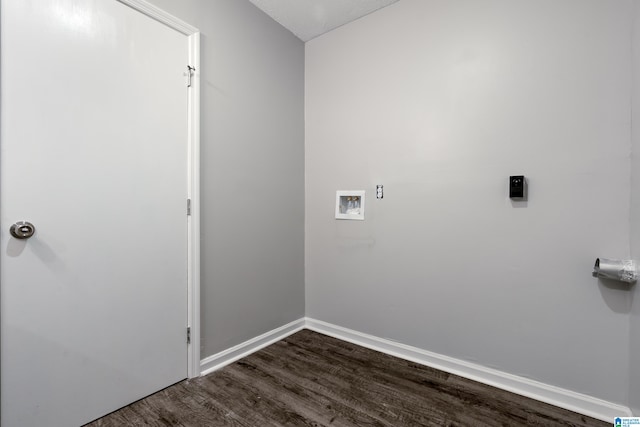 washroom with wood-type flooring and washer hookup