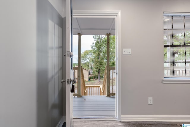 entryway with wood-type flooring