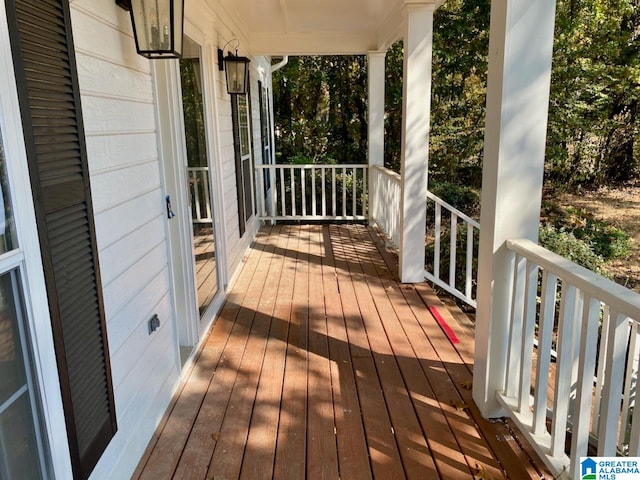 wooden deck featuring a porch