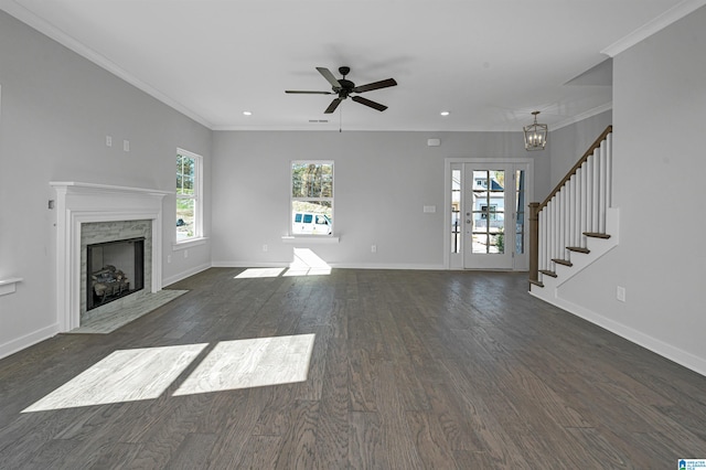 unfurnished living room with ornamental molding, a fireplace, and dark hardwood / wood-style flooring