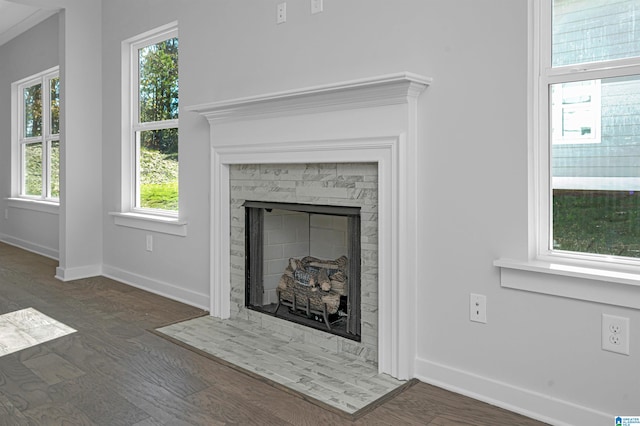 room details featuring hardwood / wood-style floors and crown molding