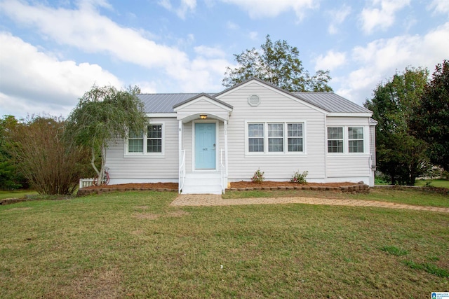 ranch-style home with a front yard