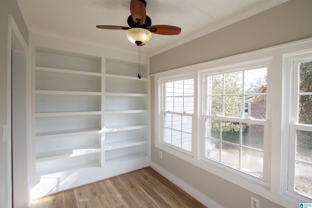 interior space with ornamental molding, light hardwood / wood-style floors, and ceiling fan