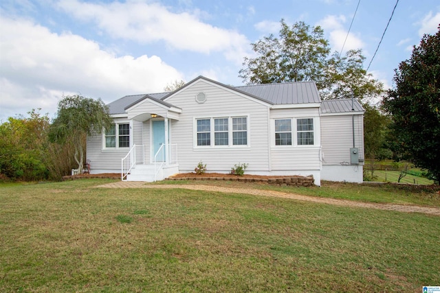 view of front of house with a front lawn